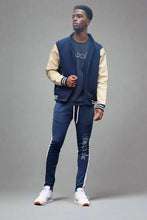 Load image into Gallery viewer, Clouded Ocean blue joggers appearance NYFW runway 